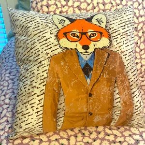 A Fox pillow. Orange faced fox.